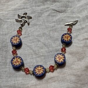 Sun Motif Blue and Red Bracelet